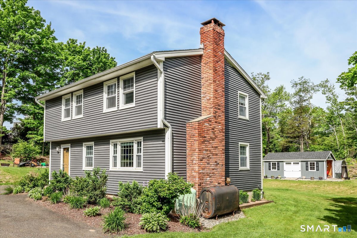 19 Botsford Hill Road Newtown, CT 06470 - Photo 2 of 40 a view of a house with a yard