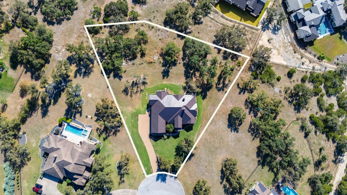 8040 Carlton Ridge Cove Austin, TX 78738 - Photo 32 of 40 an aerial view of a house