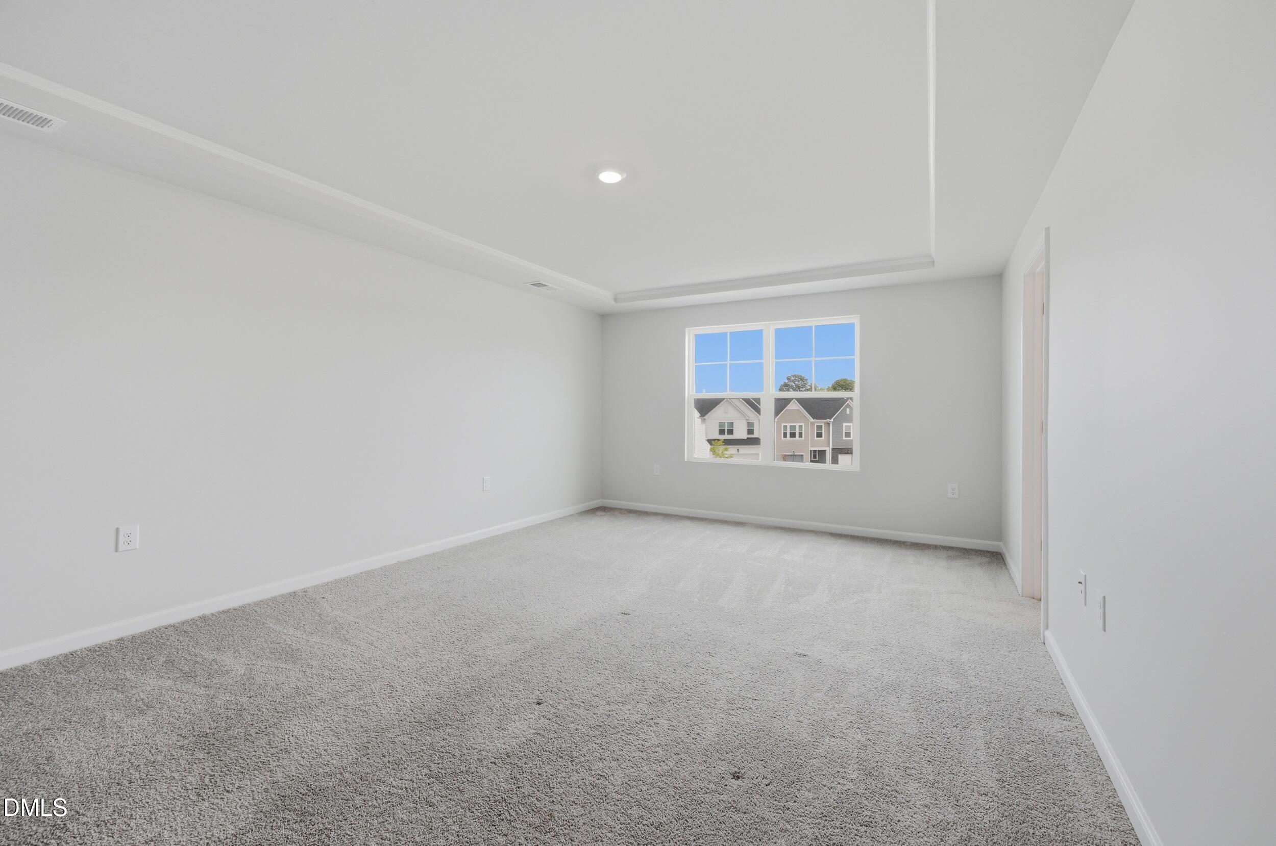 5011 Kota Street Raleigh, NC 27610 - Photo 32 of 42 an empty room with a window