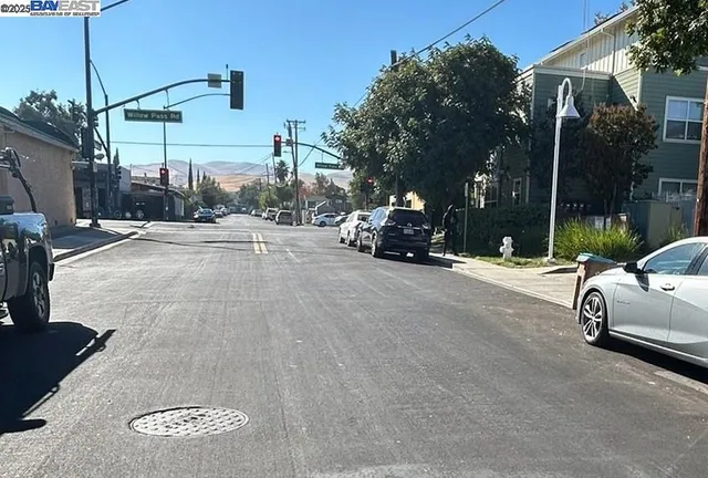 a view of a road with cars on a road