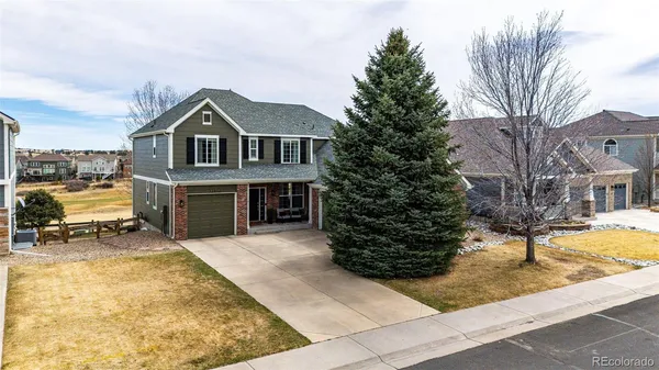 a front view of a house with a garage