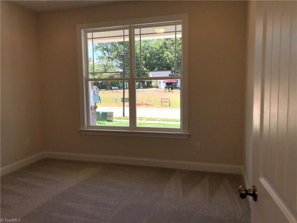 3408 Amber Mdws Road, Unit 34 High Point, NC 27265 - Photo 19 of 30 Main level bedroom 2 in front of home