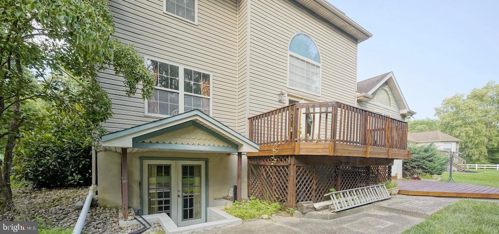 2 Gaskill Road Mount Laurel, NJ 08054 - Photo 7 of 39 Rear view of the house with walk out basement door