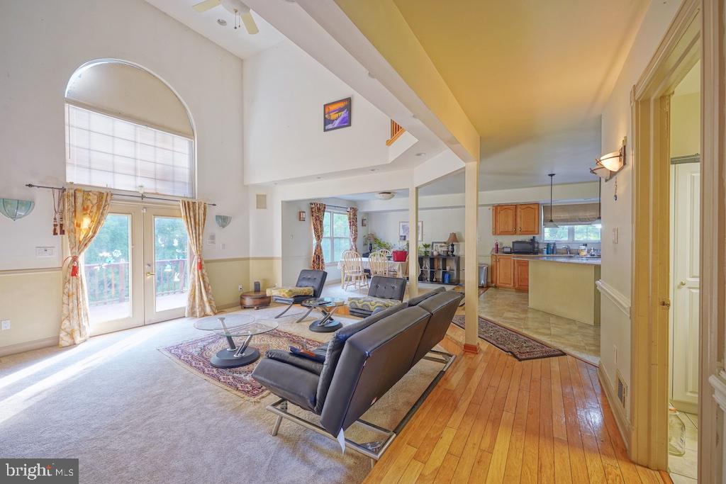 2 Gaskill Road Mount Laurel, NJ 08054 - Photo 10 of 39 Grant high ceiling in family room opening to deck
