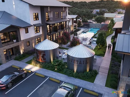 a view of a chairs and table in patio