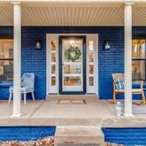 a view of living room kitchen with furniture and window