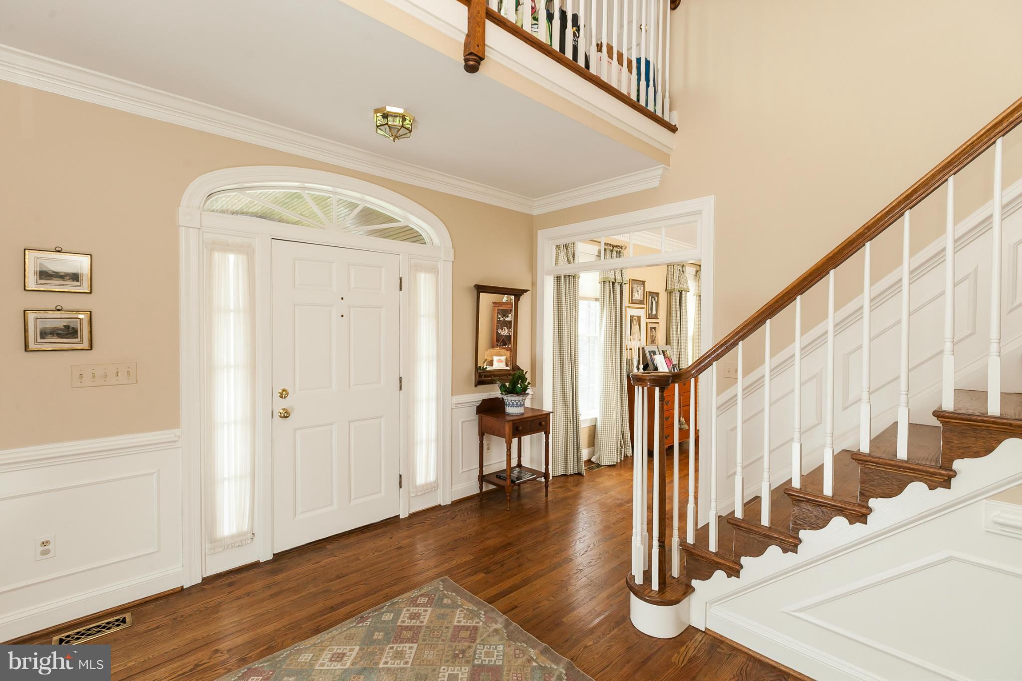 3611 Jackson Cabin Road Phoenix, MD 21131 - Photo 3 of 27 a view of entryway with wooden floor and stairs