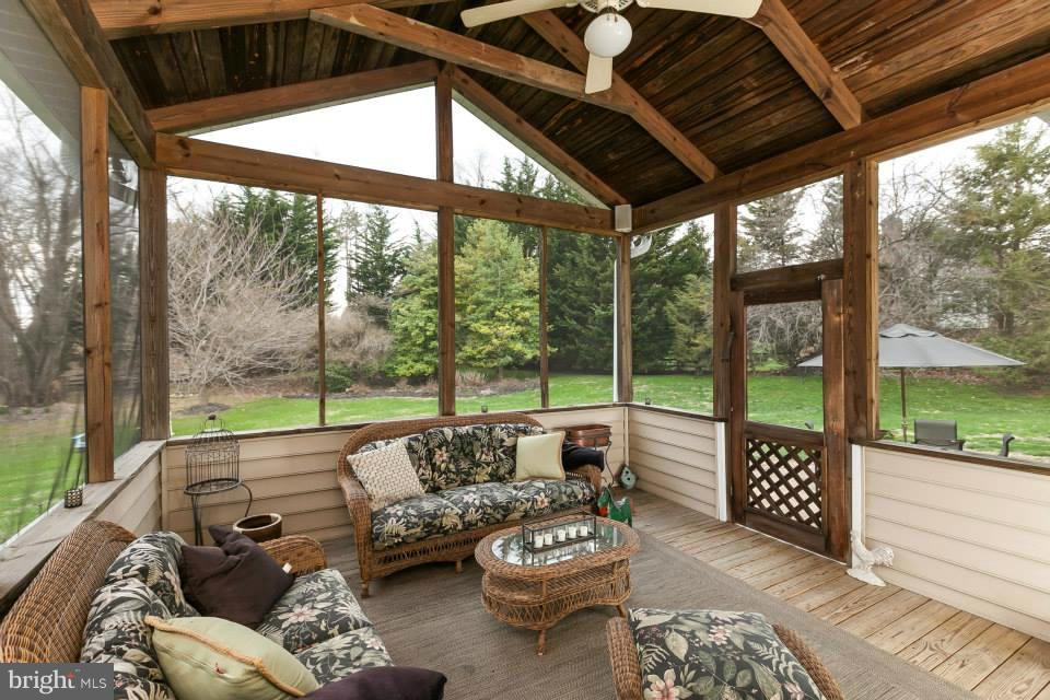 3611 Jackson Cabin Road Phoenix, MD 21131 - Photo 22 of 27 a balcony with furniture and large windows