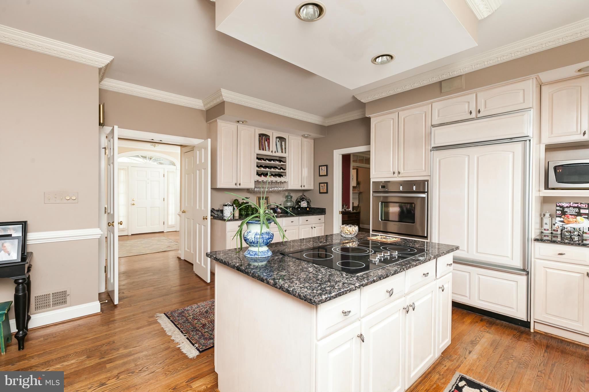 3611 Jackson Cabin Road Phoenix, MD 21131 - Photo 8 of 27 a kitchen with stainless steel appliances granite countertop a sink stove and refrigerator