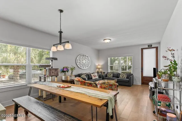 a bedroom with bed and a flat screen tv