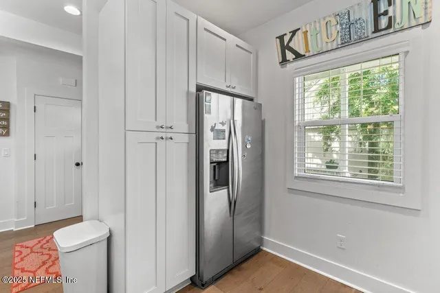 a view of a kitchen and dining room