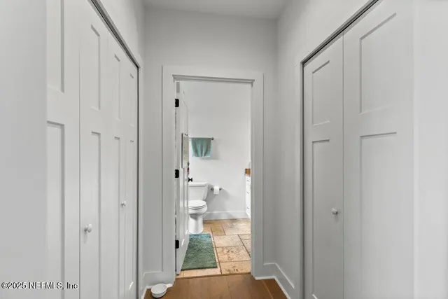 a bathroom with a window and shower