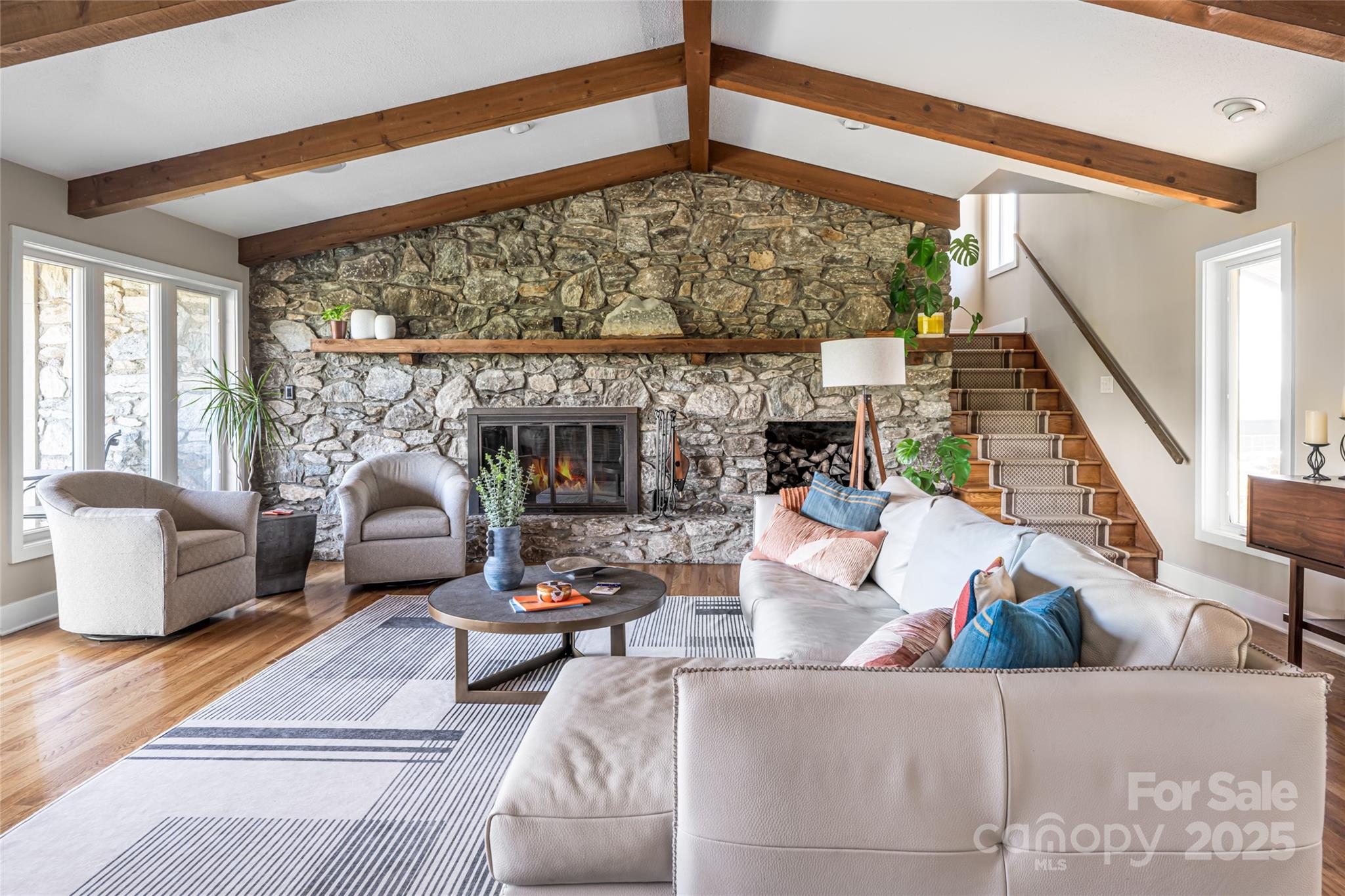 79 Horizon Hill Road Asheville, NC 28804 - Photo 12 of 48 a living room with furniture and a large window