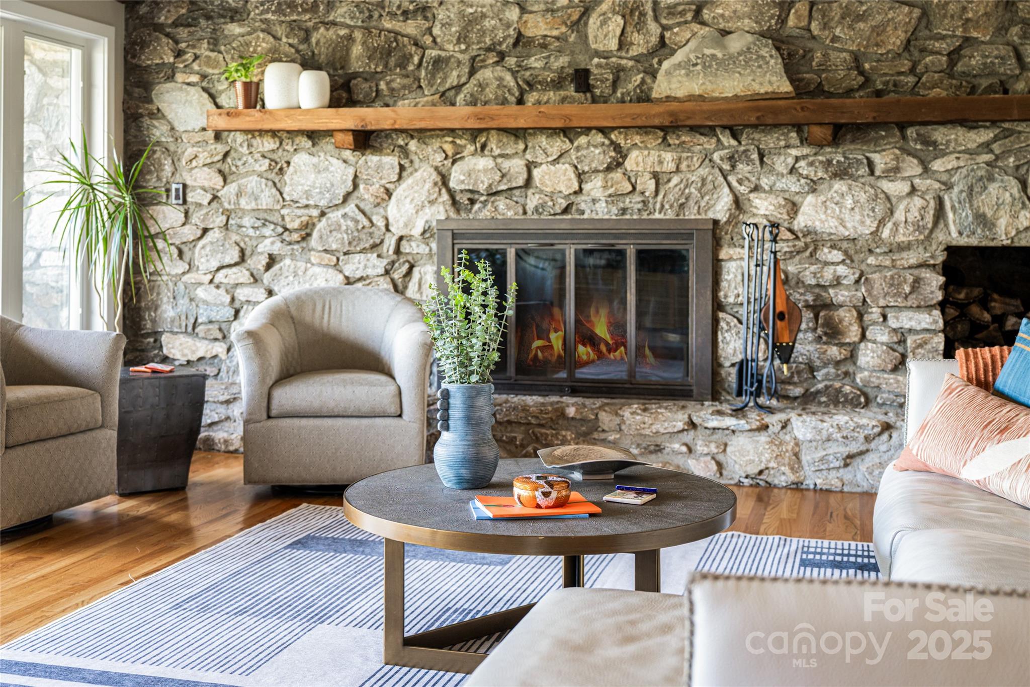 79 Horizon Hill Road Asheville, NC 28804 - Photo 13 of 48 a living room with furniture and a wooden floor
