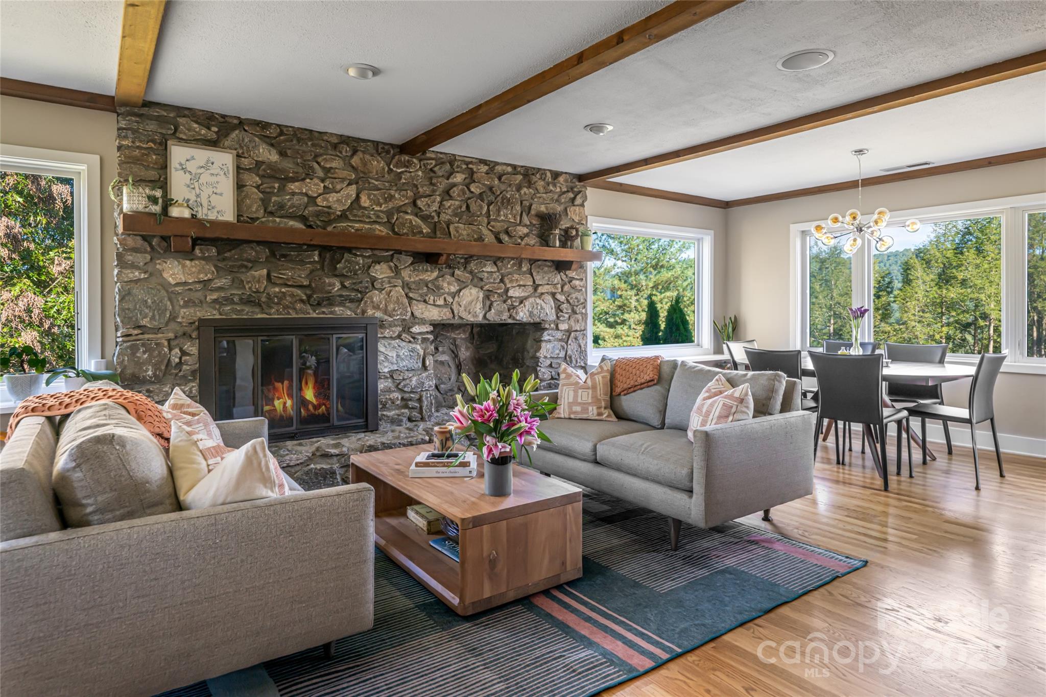 79 Horizon Hill Road Asheville, NC 28804 - Photo 17 of 48 a living room with furniture and a fireplace
