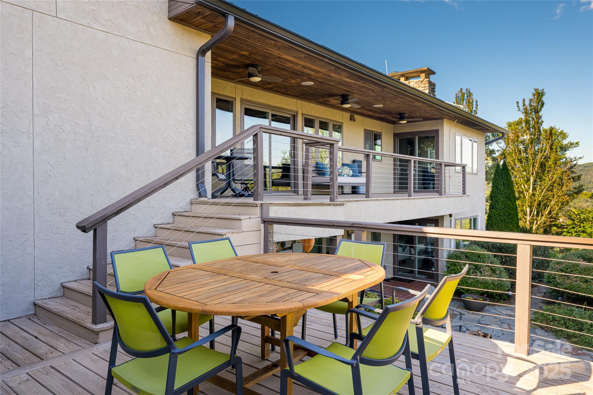 79 Horizon Hill Road Asheville, NC 28804 - Photo 41 of 48 a balcony view with couple of chairs and wooden floor