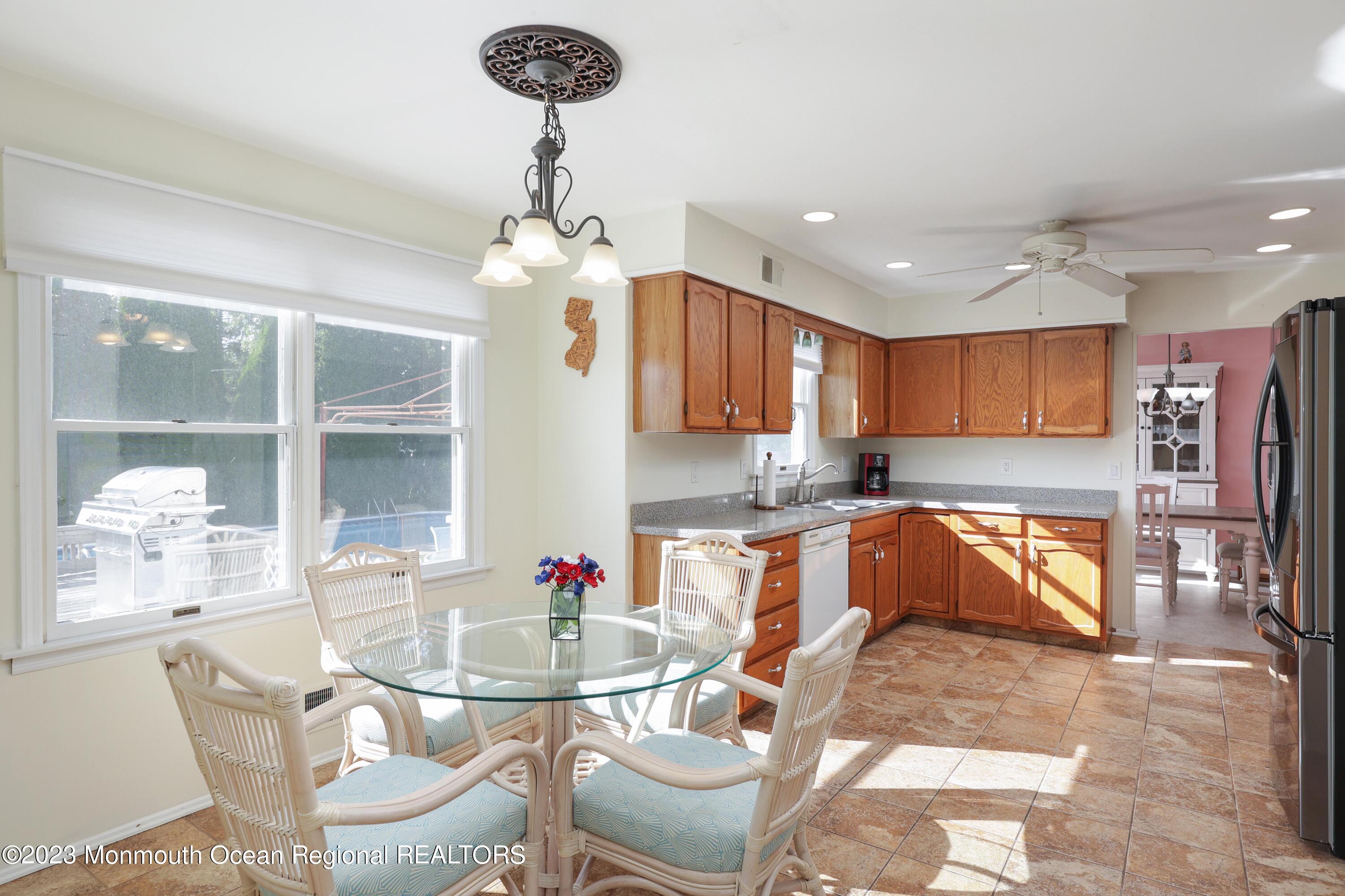 146 Jordan Road Brick, NJ 08724 - Photo 15 of 36 a kitchen with stainless steel appliances granite countertop a sink and a refrigerator