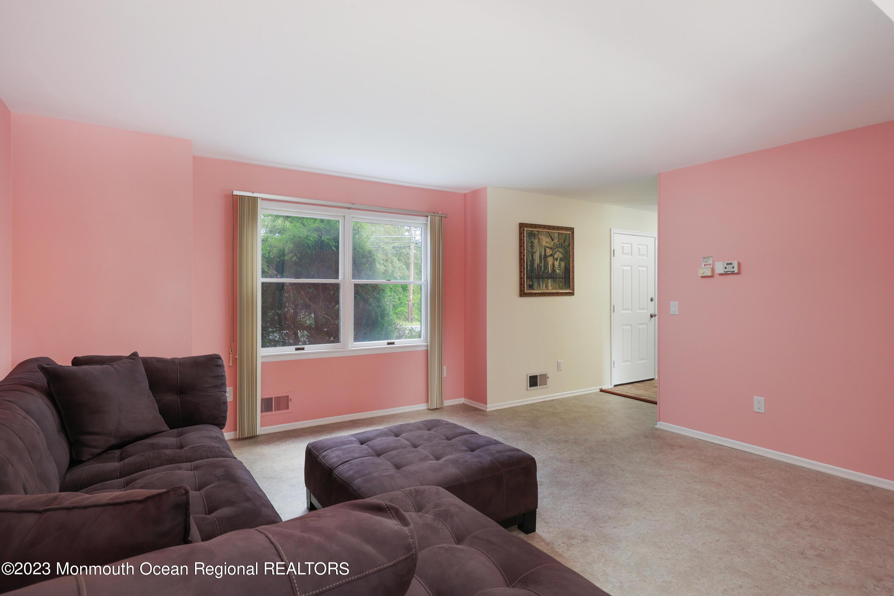 146 Jordan Road Brick, NJ 08724 - Photo 18 of 36 a living room with furniture and a window