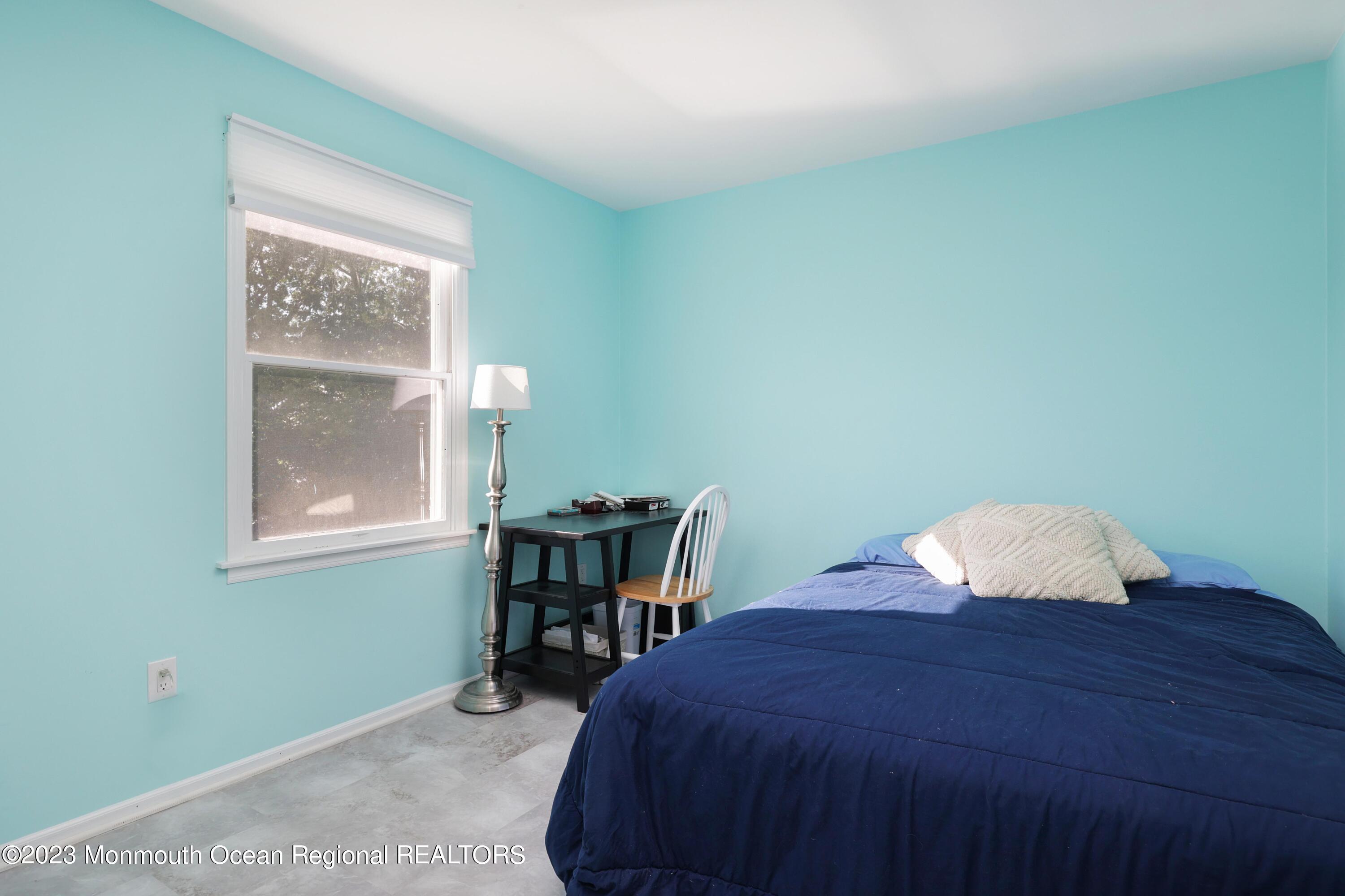 146 Jordan Road Brick, NJ 08724 - Photo 22 of 36 a bedroom with a bed and a window