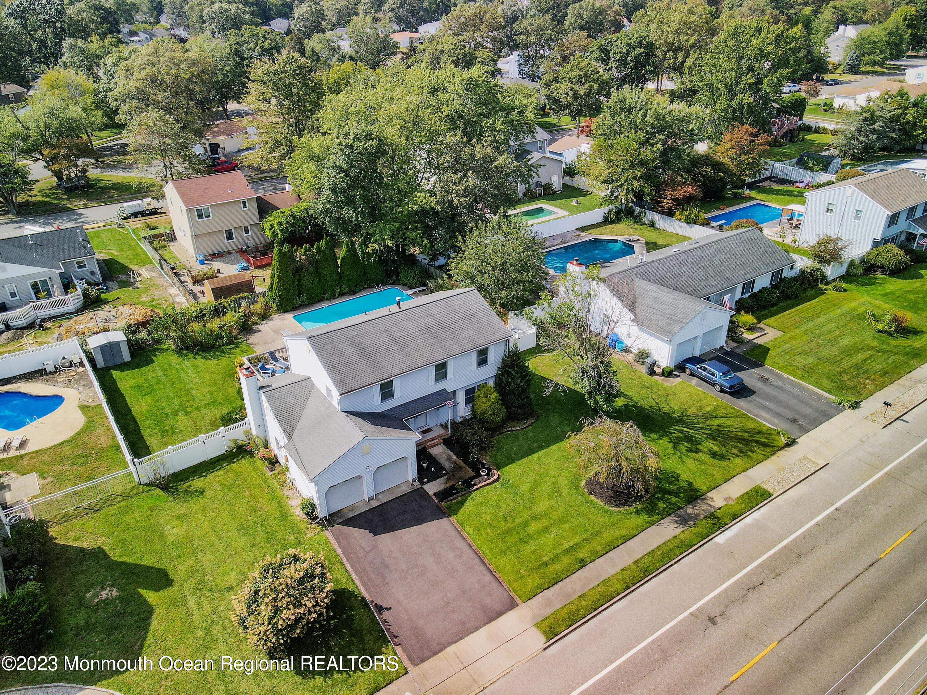 146 Jordan Road Brick, NJ 08724 - Photo 28 of 36 an aerial view of a house with garden space and street view
