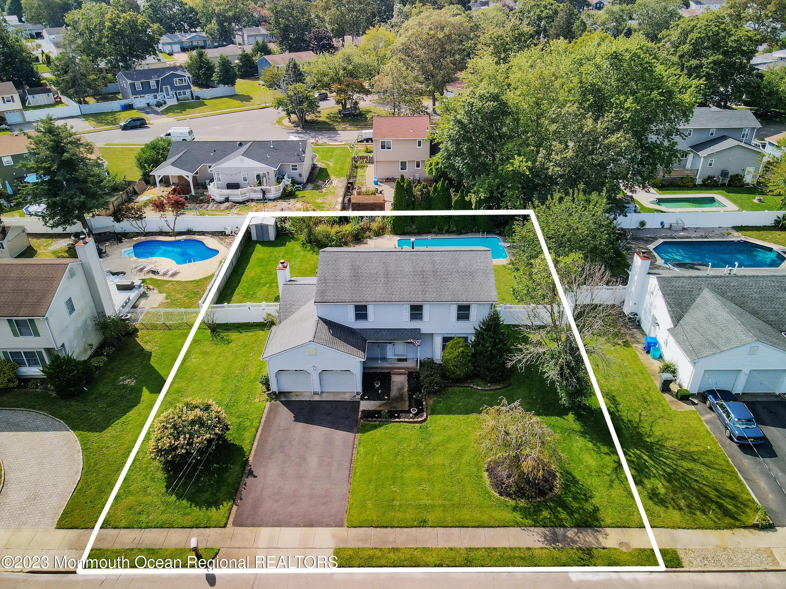 146 Jordan Road Brick, NJ 08724 - Photo 5 of 36 an aerial view of a house with swimming pool garden and patio