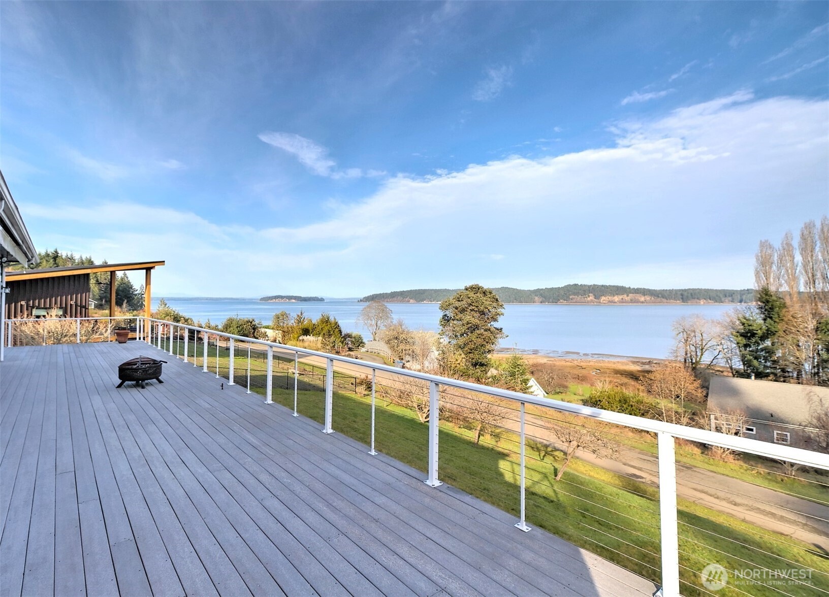a view of a balcony with an ocean view