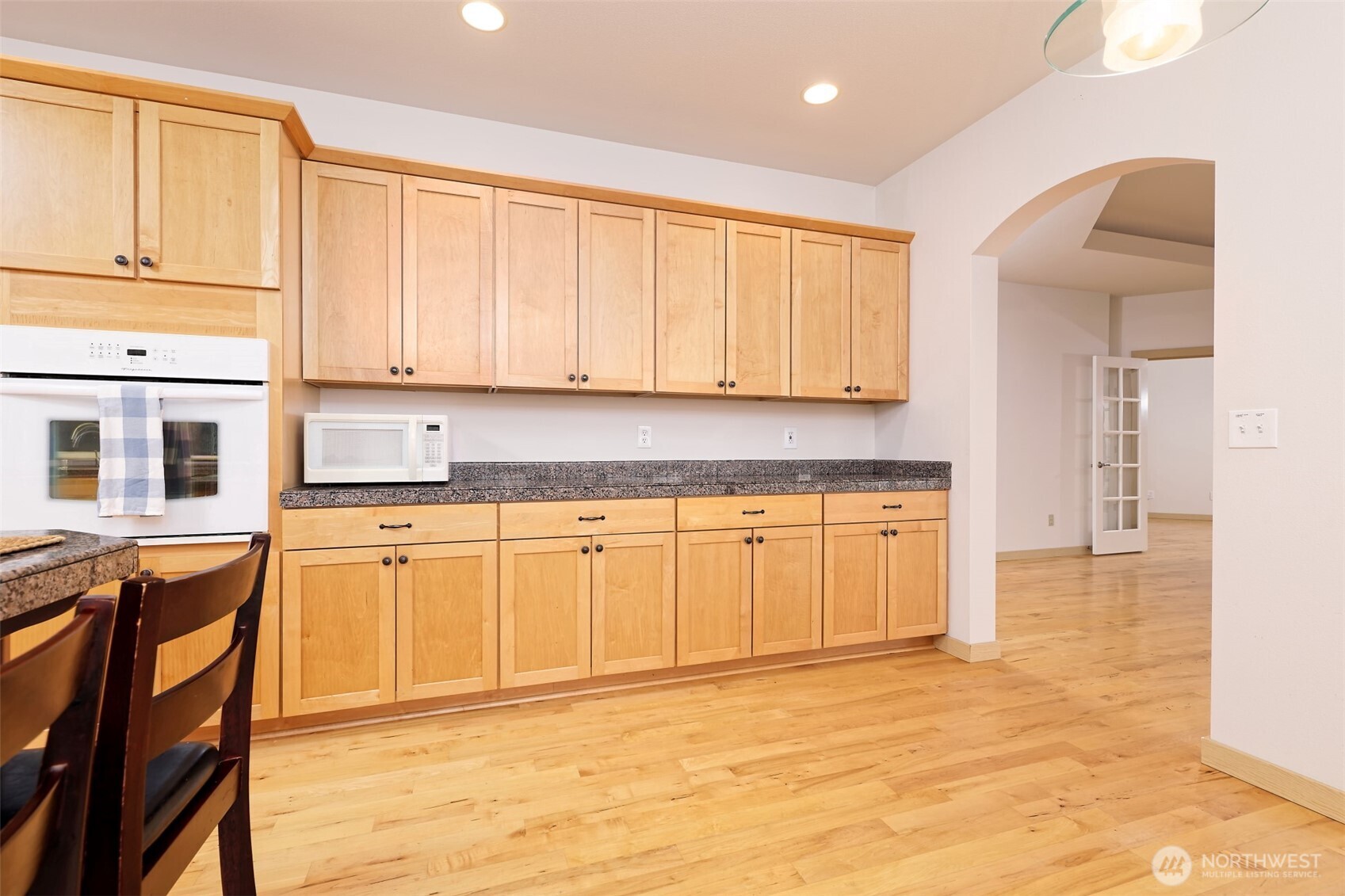 20 East Case View Place Shelton, WA 98584 - Photo 15 of 40 a kitchen with stainless steel appliances granite countertop a stove a sink and a refrigerator