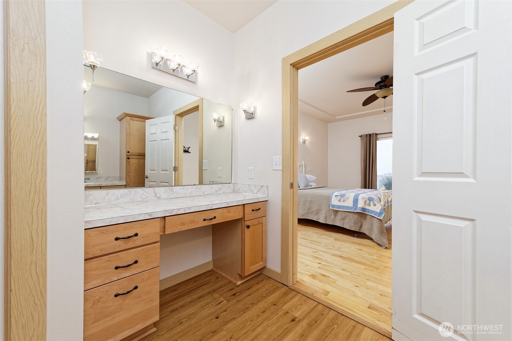 20 East Case View Place Shelton, WA 98584 - Photo 21 of 40 a spacious bathroom with a granite countertop sink and a mirror