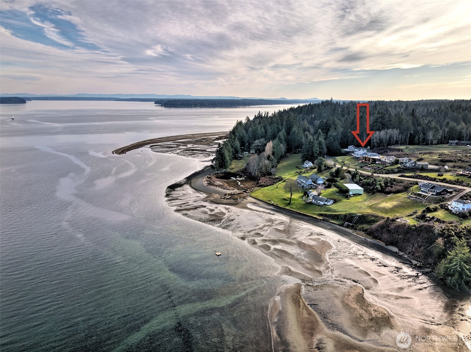 20 East Case View Place Shelton, WA 98584 - Photo 3 of 40 a view of a backyard with lawn chairs and iron fence