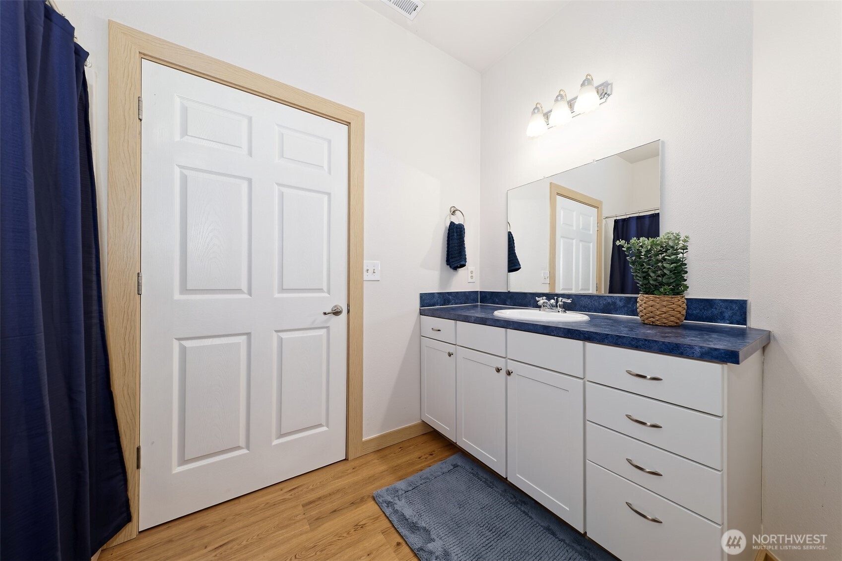 20 East Case View Place Shelton, WA 98584 - Photo 31 of 40 a bathroom with a double vanity sink and mirror