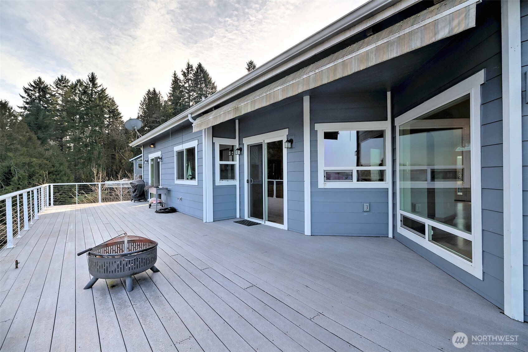 20 East Case View Place Shelton, WA 98584 - Photo 34 of 40 a view of a deck with wooden floor and seating space