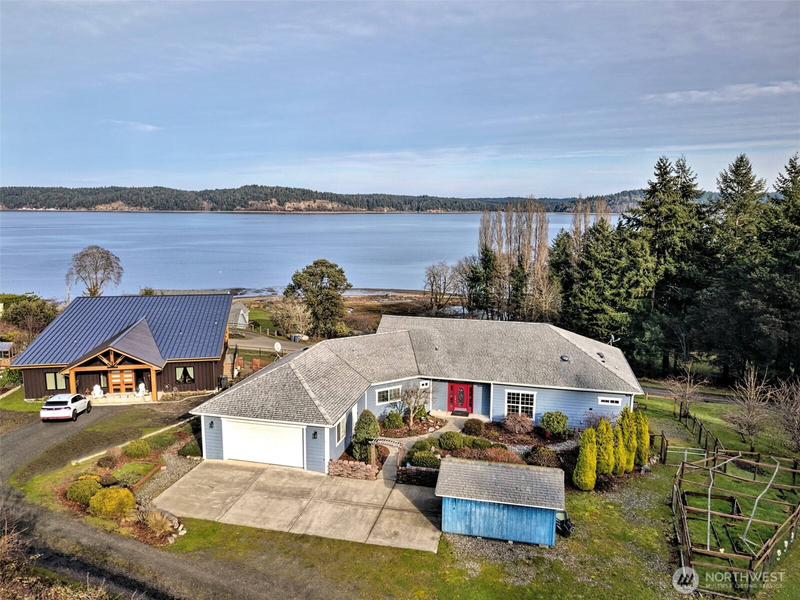 20 East Case View Place Shelton, WA 98584 - Photo 39 of 40 a aerial view of a house with patio and lake view