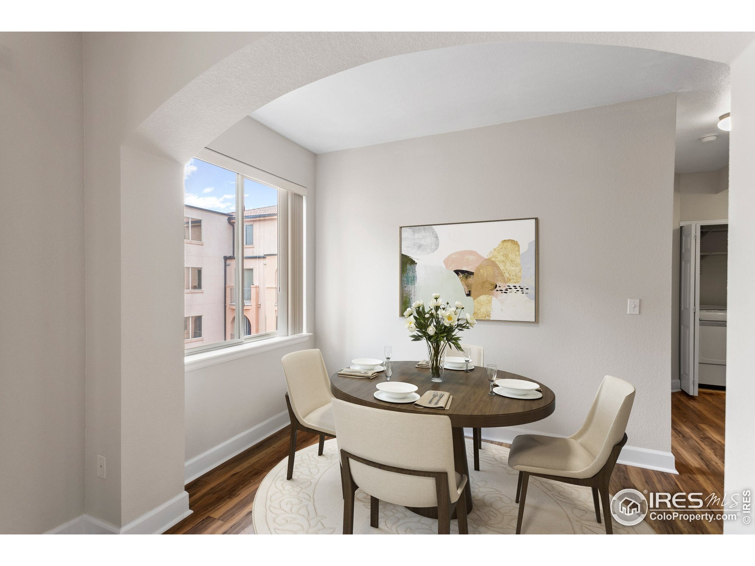 4500 Baseline Road, Unit 3302 Boulder, CO 80303 - Photo 11 of 22 a view of a dining room with furniture and chandelier