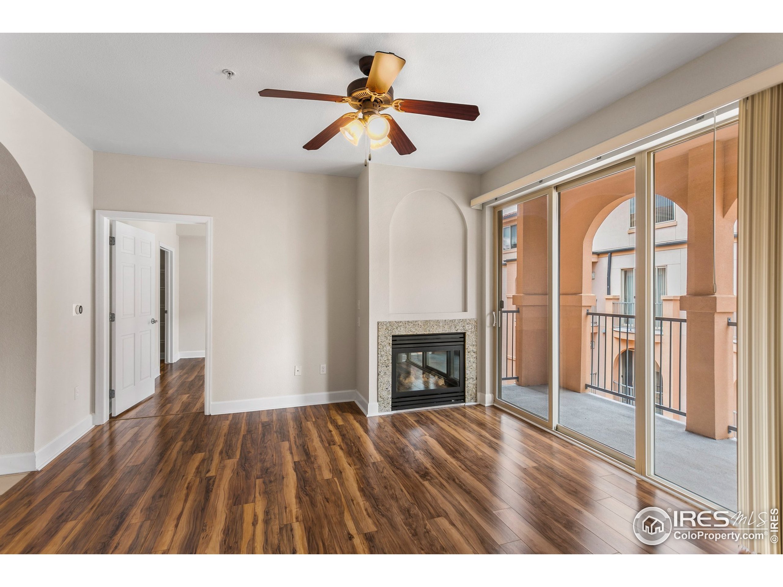 4500 Baseline Road, Unit 3302 Boulder, CO 80303 - Photo 7 of 22 a view interior of a house wooden floor fire place and a window