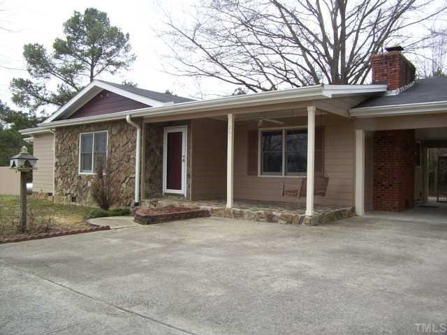 201 Cooper Branch Road Clayton, NC 27520 - Photo 1 of 12 Stone front