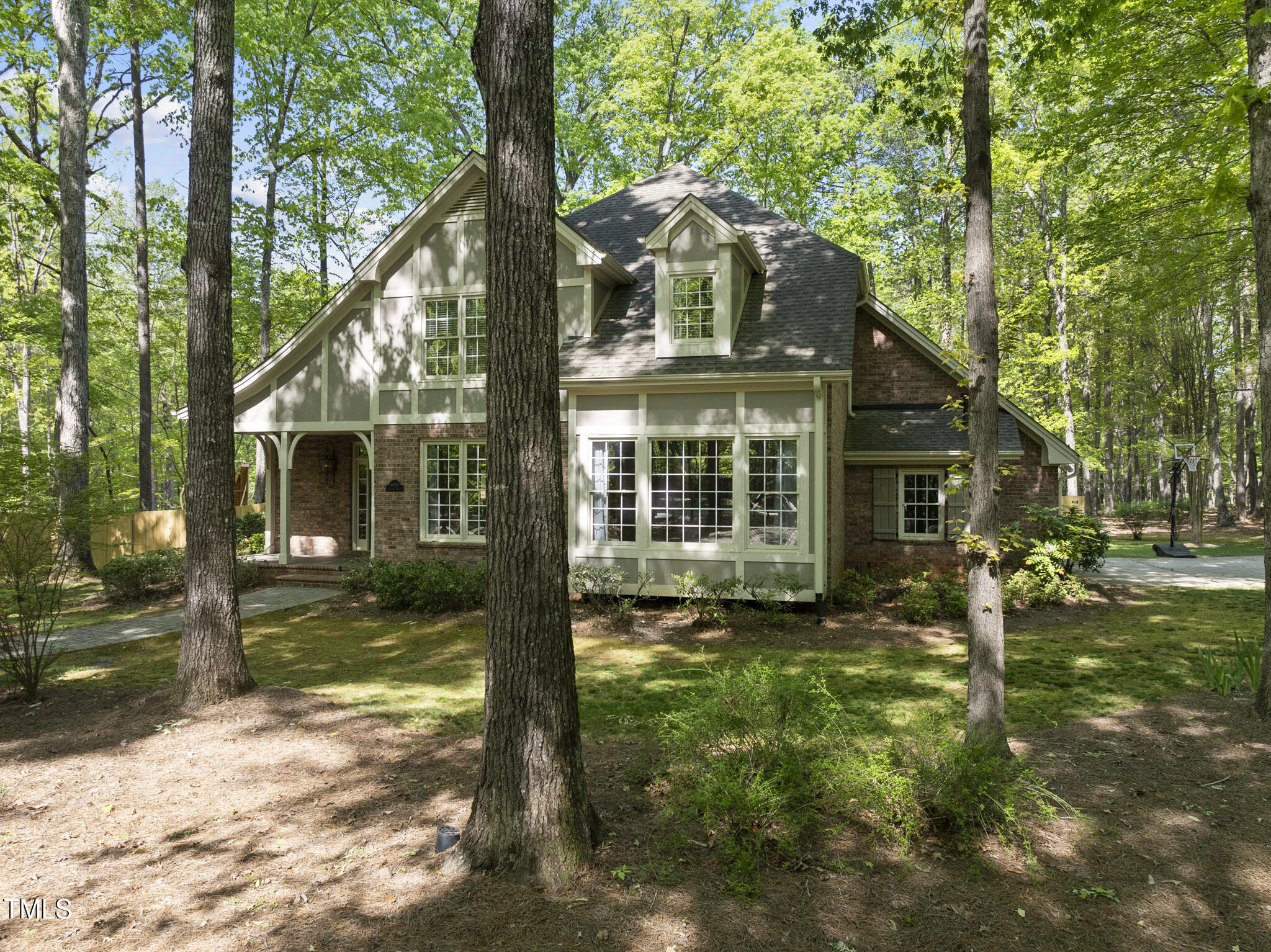 6000 Canadero Drive Raleigh, NC 27612 - Photo 2 of 74 Nestled in the Woods