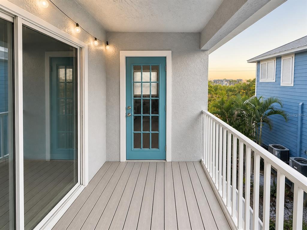 1013 Apollo Beach Boulevard, Unit 202 Apollo Beach, FL 33572 - Photo 11 of 18 a view of balcony with wooden floor