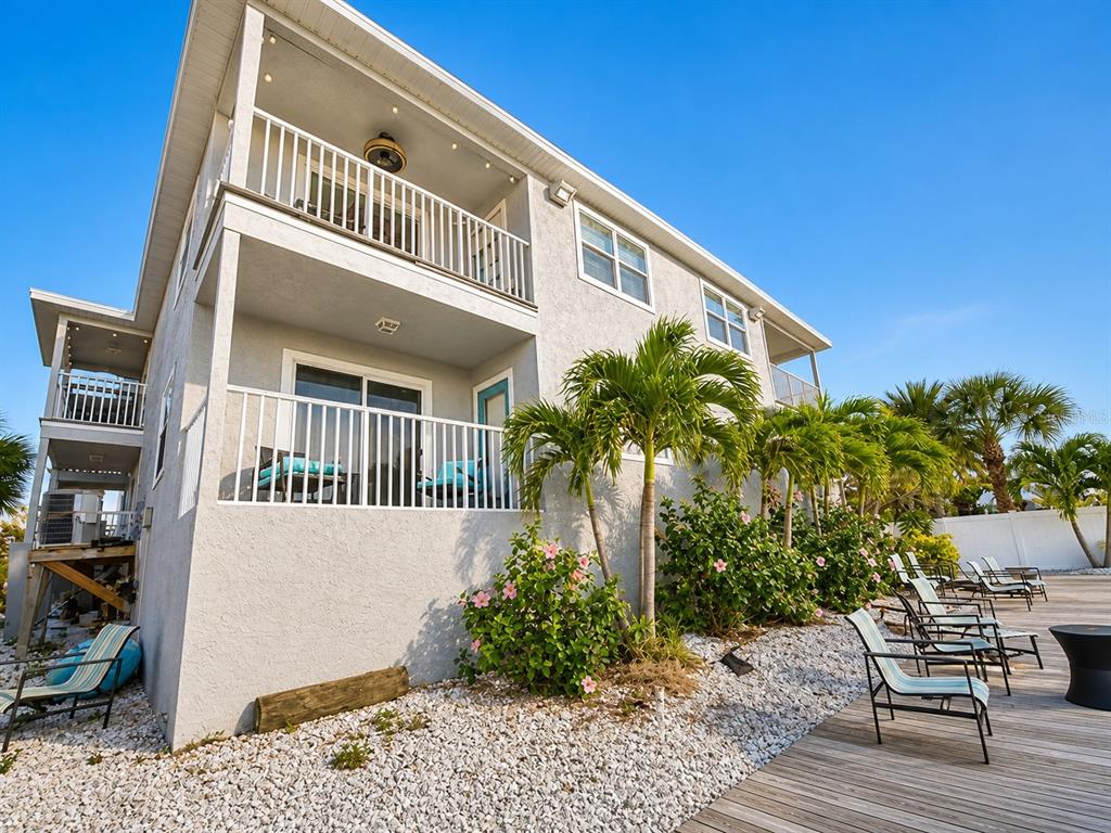 1013 Apollo Beach Boulevard, Unit 202 Apollo Beach, FL 33572 - Photo 17 of 18 a front view of a house with garden