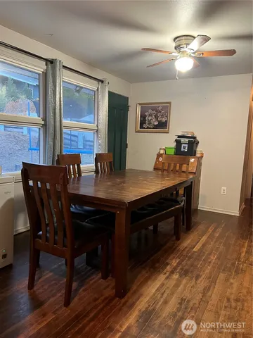 a view of a dining room with furniture