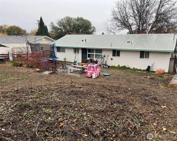 a front view of a house with an outdoor space