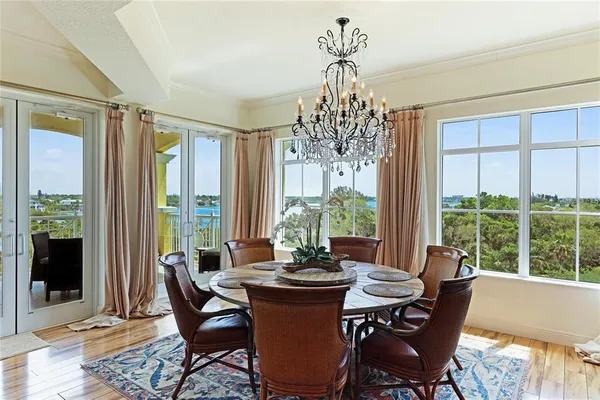 a kitchen with stainless steel appliances granite countertop a stove and cabinets