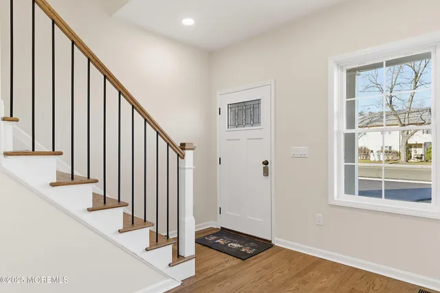 a view of an entryway with staircase