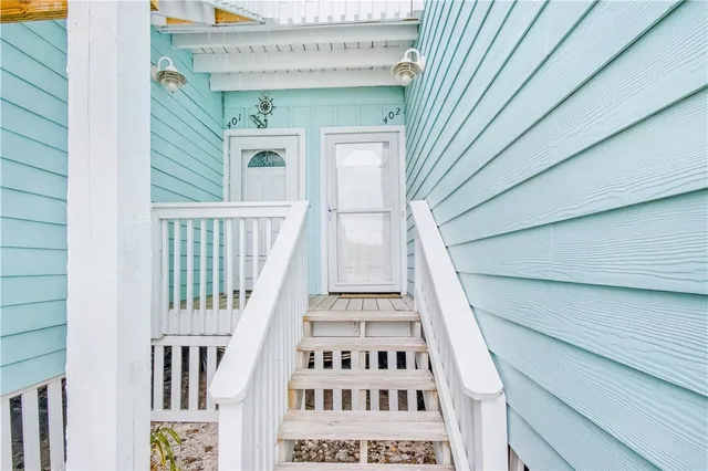 a view of a balcony with staircase