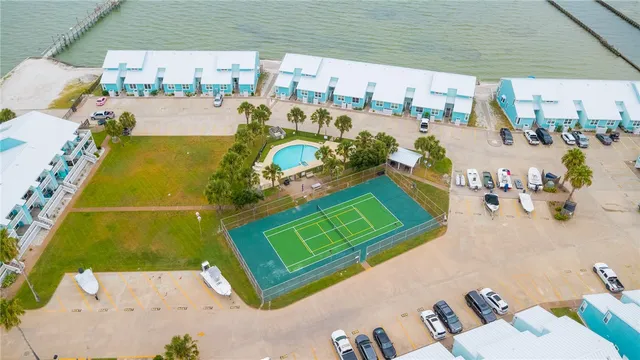swimming pool view with a seating space