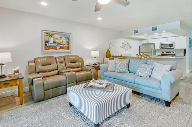 a living room with furniture and a couch