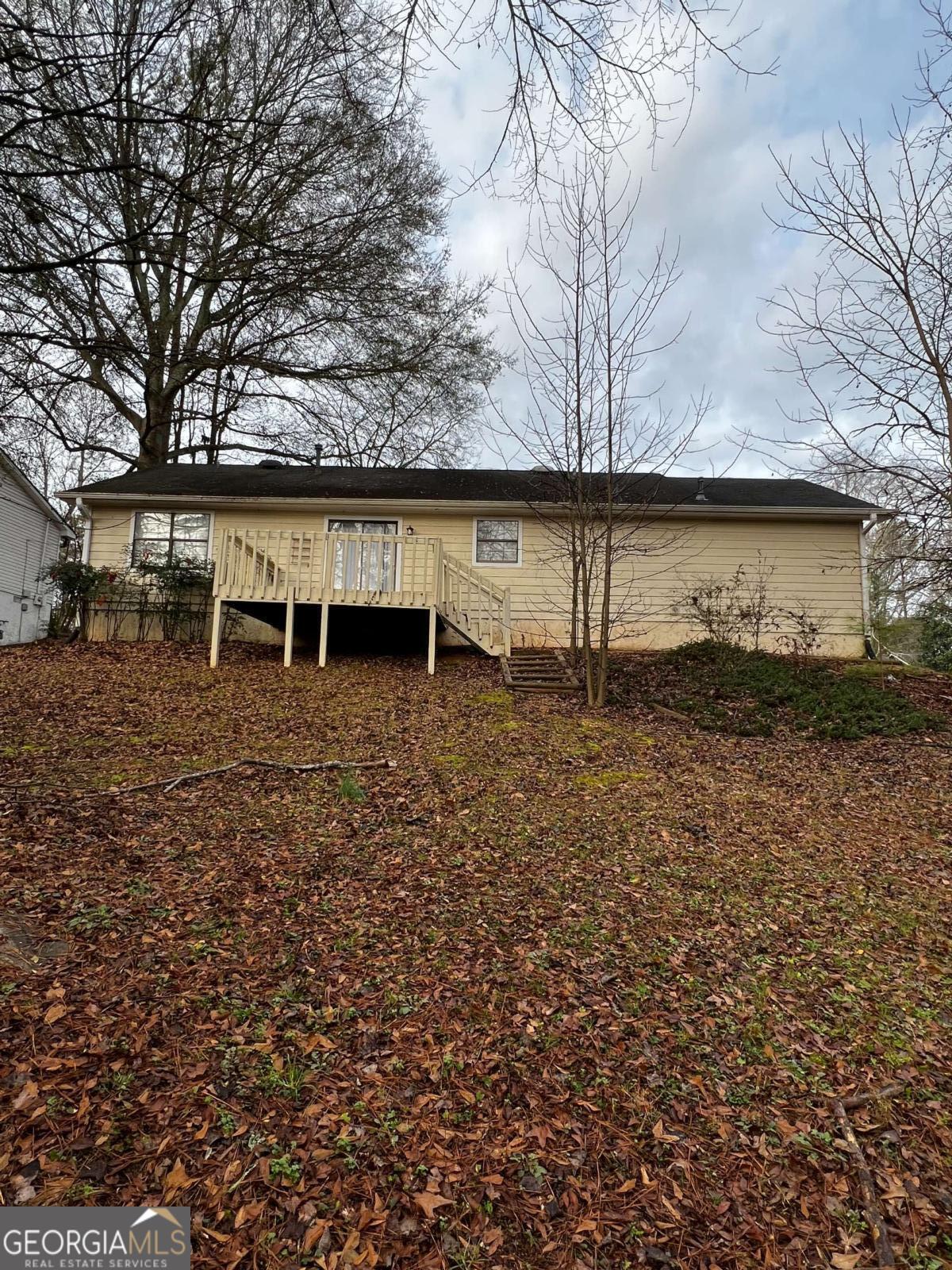 164 Adrian Drive Stockbridge, GA 30281 - Photo 12 of 12 a backyard of a house with lots of green space