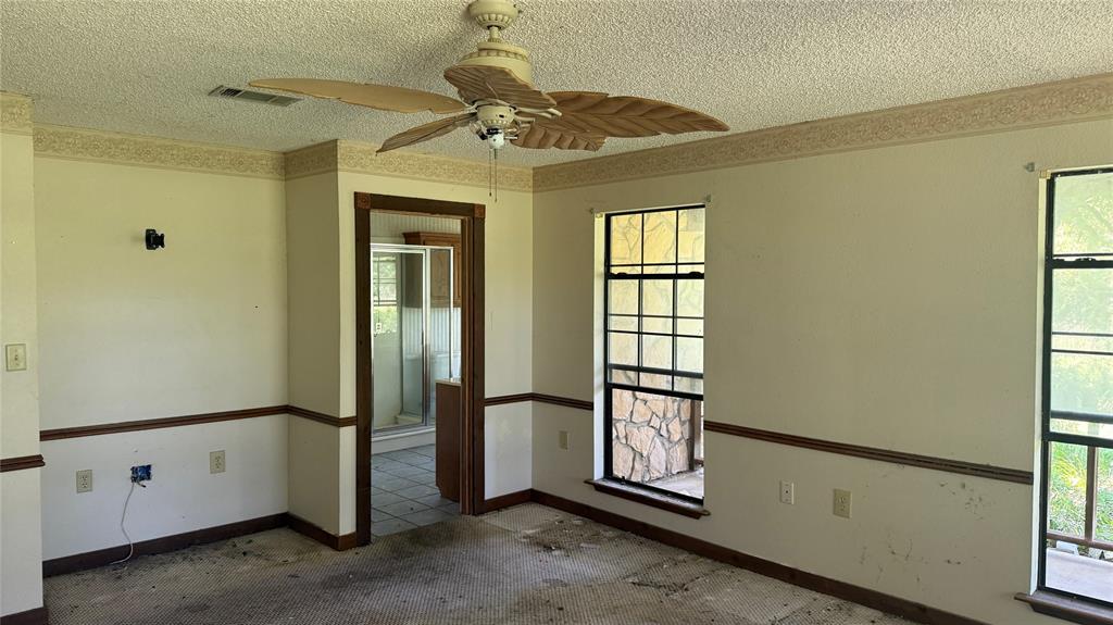6582 Taylor Road Kaufman, TX 75142 - Photo 27 of 40 an empty room with windows