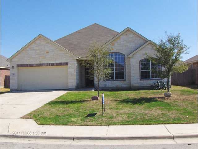 187 Valruth Drive Kyle, TX 78640 - Photo 1 of 1 a front view of a house with a yard
