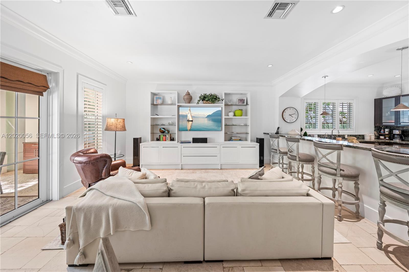 4196 Douglas Road Miami, FL 33133 - Photo 37 of 96 a living room with furniture and a large window