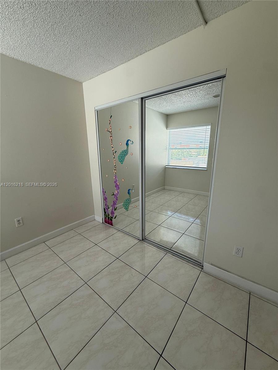 9321 Southwest 4th Street, Unit 230C Miami, FL 33174 - Photo 34 of 37 a view of empty room